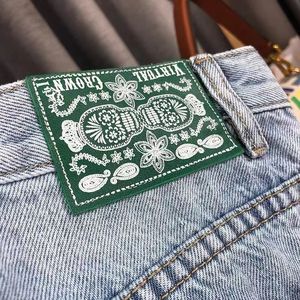 Luxury Custom Woven Garment Label - Multi-color jacquard satin texture, flat fold, for neckline sewn organic garments - Product Image 3