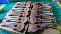 Factory Discount Price on 23 Inches Mahogany Wood Beginner 4Nylon String Guitar Christmas Gift with Musical Instruments
