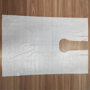 Delantal de poliéster para salón de adultos, oferta desechable, PE, belleza, cierre ajustable, peluquería, el más barato - Product Image 1