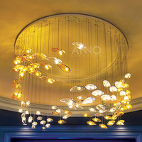 Lustre en verre et plumes de luxe ANNO pour projet d'escalier duplex