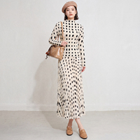 Ensemble deux pièces plissé pour femme, imprimé taches d'encre, haut à col montant et manches longues & jupe longue, style Miyake élégant, vente en gros