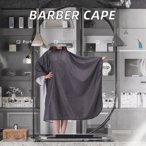 Cape de coiffure portable en caoutchouc noir avec logo personnalisé Leeons pour salons de coiffure - Product Image 2