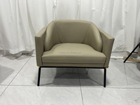 Fauteuil d'appoint de luxe minimaliste italien, structure métallique, revêtement en cuir, fauteuil de salon individuel pour villa
