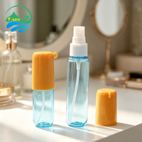 Flacon pulvérisateur unique en plastique en forme de capsule 30ml 50ml PET avec pulvérisateur à fine brume pour soins personnels, désinfectant pour les mains, avec porte-clés