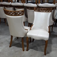 Chaise de salle à manger minimaliste faite à la main en bois massif avec siège en cuir pour la maison, le mobilier domestique et la vente en gros commerciale