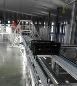 Palet montaj yerçekimi rulo bölümleri ve kaldırıcı konveyör ile yeni komple palet konveyör sistemi zincirli konveyör - Product Image 2