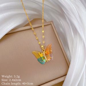 Collana con ciondolo a farfalla in resina di colore graduale oro acciaio al titanio collana di moda gioielli per regali - Product Image 3
