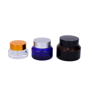 Tarro de vidrio redondo de 50g/100g transparente/negro/verde/azul con hombro inclinado y tapa de plástico dorada/negra - Product Image 4