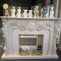 Cheminée décorative en marbre naturel blanc, sculptée à la main, pour l'intérieur