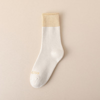 Chaussettes épaisses pour femmes, mi-mollet, en coton peigné avec doublure polaire et boucles épaissies pour un confort personnalisé en hiver, color-block