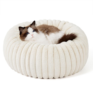 Cama redonda cálida y cómoda de lujo para mascotas con patrón sólido para perros y gatos - Product Image 4