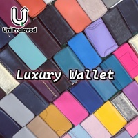 Cartera de Cuero Genuino de Alta Calidad A10, Marca de Lujo Original, Estilo Casual, Varios Modelos, Económica, Popular, Unisex, al por Mayor