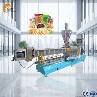 Machine extrudeuse automatique pour la fabrication de snacks soufflés creux et de maïs soufflé