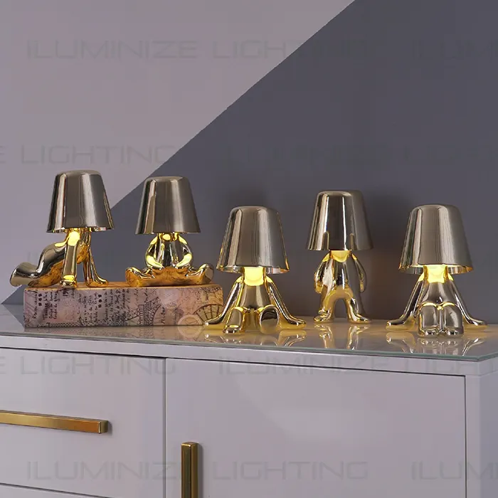 A set of very interesting gold metal small thinker lamp collection usb rechargeable