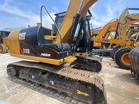 Excavatrice CAT 312D d'occasion en excellent état, faible usage, capacité de godet de 0,52 m³, moteur puissant de 72 kW, vente flash