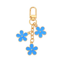 Porte-clés et pendentif de sac double face en alliage de zinc, motif fleur goutte d'huile, mignon et tendance, avec logo personnalisé, étanche et léger