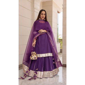 Newly Arrival Falguni <b>Purple</b> Kurta <b>Skirt</b> Set with Organza Dupatta and Potli Plain Pattern Kurta <b>Skirt</b> Set For Sale - Product Image 1