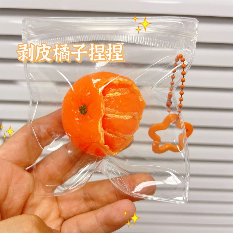 Nuevas naranjas peladas para exprimir - colgante de estrella de cinco puntas en PVC.