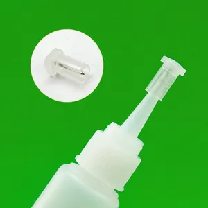 Bouteille de colle de cils adhésive d'aiguille de broche en plastique en métal de poussée intégrée avec des goupilles de buse outil essentiel pour les cils