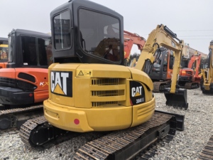 Mini-pelles CAT 304 d'occasion, 4 tonnes, excavatrice sur chenilles, machinerie hydraulique avec accessoire tarière, certifiée EPA CE - Product Image 4