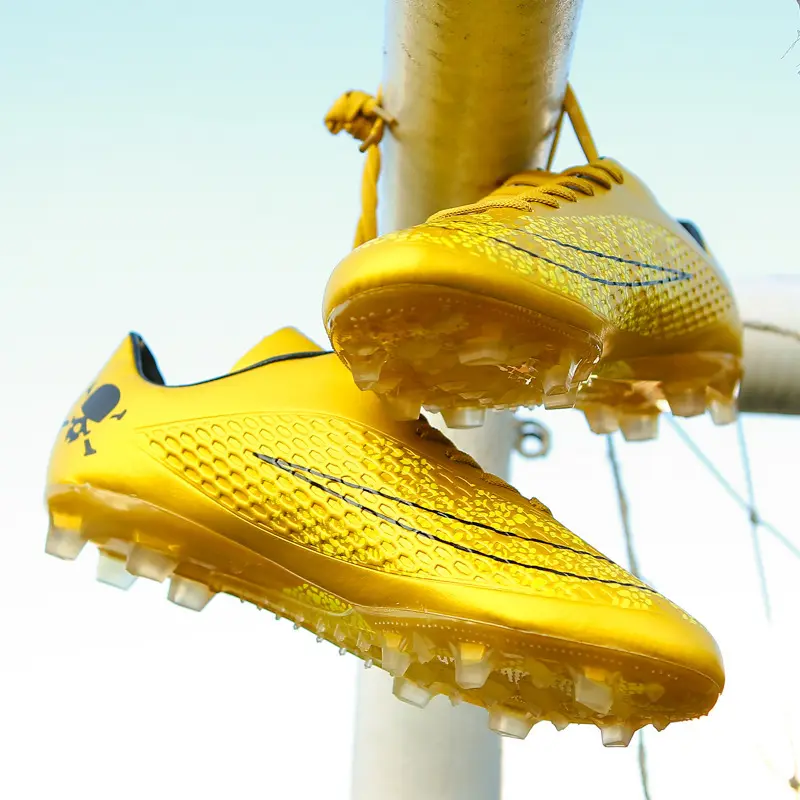 Gold football boots men's and women's low-top leather spikes and flat flat children's artificial grass sports training shoes