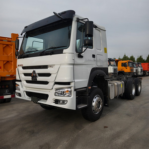 Camión con cabeza de tractor HOWO <span class=keywords><strong>Actros</strong></span> 6X4 usado, remolque diésel de <span class=keywords><strong>segunda</strong></span> <span class=keywords><strong>mano</strong></span> a la venta Euro 2, estándar de emisión, cámara de dirección trasera izquierda - Product Image 1