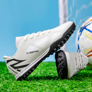 <span class=keywords><strong>Scarpe</strong></span> <span class=keywords><strong>da</strong></span> <span class=keywords><strong>Calcio</strong></span> con <span class=keywords><strong>Tacchetti</strong></span> per Bambini Direttamente dalla Fabbrica Zhen |   Tomaia in PU Unisex con Suola in Gomma |   <span class=keywords><strong>Scarpe</strong></span> <span class=keywords><strong>da</strong></span> <span class=keywords><strong>Calcio</strong></span> per Tutte le Stagioni |   Accetta - Product Image 1