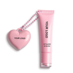 Brillo Labial en Tubo Rosa con Logotipo Personalizado, Rubor en Forma de Corazón Colgante, Tono de Piel, Tamaño de Viaje, Acabado Brillante - Product Image 1