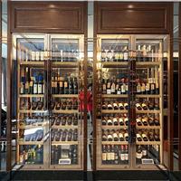 Cave à vin de luxe encastrable murale avec climatisation et porte vitrée, pour rangement de bouteilles et présentation, design moderne pour la maison