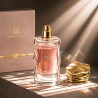 Flacon de parfum premium en verre, 50 ml, cylindrique, corps incurvé, transparent, avec pulvérisateur, personnalisation possible