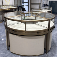 Présentoir de kiosque de centre commercial au design moderne Présentoir d'exposition de montres en acier inoxydable au détail Armoire de table à bijoux en verre transparent