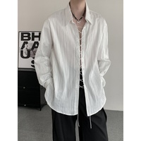 Chemise blanche décontractée pour homme, coupe ample, à rayures verticales, manches longues, avec laçage sur le devant, idéale pour le streetwear quotidien