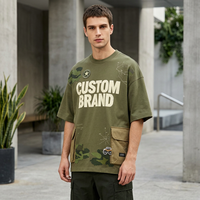 T-shirt pour homme en tricot vert olive à col rond, imprimé graphique camouflage, coupe ample, manches courtes, poche cargo, logo personnalisé, streetwear