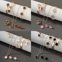 Ensemble de bijoux pour femmes, design varié, 5 pièces/4 pièces, chaîne en métal doré, breloque en émail fleur et papillon, bracelet, boucles d'oreilles, collier
