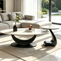 Ensemble de tables basses mobiles, plateau ovale en pierre frittée, base en métal noir artistique, table d'appoint décorative moderne pour salon et maison