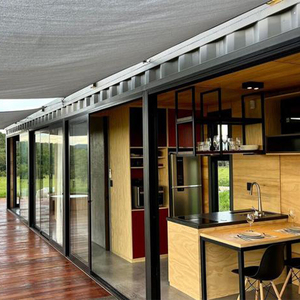 Portable 20ft préfabriqué conteneur maison paquet plat minuscule maison espace de vie pour hôtels immeubles de bureaux fait panneau sandwich - Product Image 1