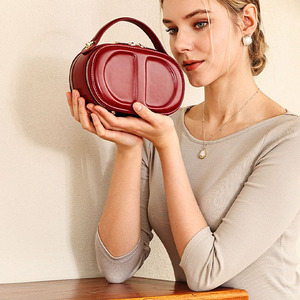 Elegant Women's Genuine Leather Oval <b>Mini</b> Bag With Round Handle Zip Closure Daily Use Handbag - Product Image 2
