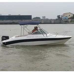 Fiberglass high-speed fishing boat equipped with an outboard motor yacht luxury boat bench cabin windshield water ladder