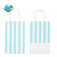 Sac en papier à emporter à rayures bleues et blanches avec sac en papier cadeau à poignée torsadée