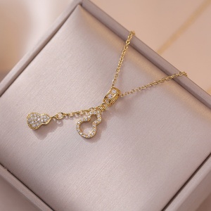 Collier ras du cou minimaliste doré style gourde étanche pour femme, bijoux de luxe glamour avec diamants, boucles d'oreilles ajourées tendance - Product Image 5