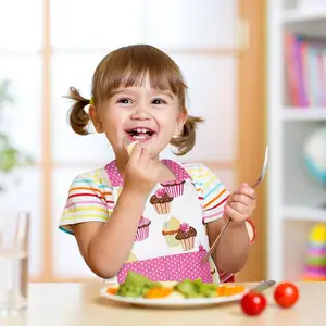 Vente en gros de tabliers pour enfants avec logo personnalisé Tablier de cuisine pour enfants avec poches à la mode Chapeau et taille de chef