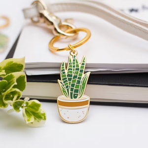 New Trend Gold Metal Custom Logo Snake Plant Enamel Keychain Zinc Alloy Hard Enamel Houseplant Car Keychain Gift for Mother