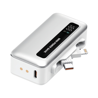 Mini Power Bank Capsule 5000mAh 2-en-1 USB-C Chargeur Portable avec Écran LCD Charge Rapide Power Bank Léger
