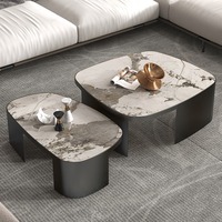 Le fabricant fournit des ensembles de tables basses rondes créatives en pierre de roche simples et modernes de style luxe léger pour salon de petite taille