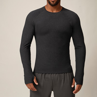 T-shirt décontracté quotidien polyvalent pour homme, à manches longues, col rond, coupe ajustée, avec trous pour les pouces, en polyester texturé et respirant, très vendu