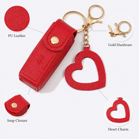 Étui à rouge à lèvres en cuir PU de qualité supérieure avec logo personnalisé, porte-clés, mini porte-gloss à lèvres avec breloque en forme de cœur