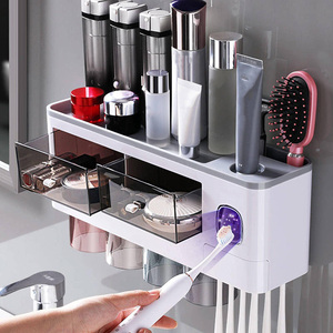 Wholesale Magnetic Toothbrush Holder Bathroom Accessories Automatic Toothpaste Squeezer Dispenser For Home Bathroom Sets Storage