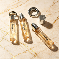 Porte-clés de luxe personnalisé, flacon de parfum vide 10ml 15ml 20ml, diffuseur en verre cylindrique fantaisie avec pulvérisateur à pompe et capuchon en Zamac