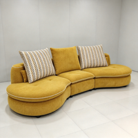 Canapé de salon populaire pour grande villa, ensemble de canapés modernes et élégants en tissu nuage pour usage domestique, nouveau canapé incurvé créatif de designer