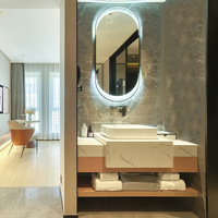 Solutions de salle de bain intégrées : cabines de douche pour espaces restreints, salles de bain préfabriquées.